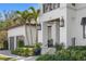 Charming home featuring a well-manicured front yard, covered entry, and a two-car garage at 2501 S Dundee St, Tampa, FL 33629