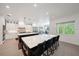 Well-lit kitchen with double islands, stainless steel appliances, and light wood floors at 2501 S Dundee St, Tampa, FL 33629
