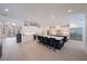Spacious kitchen with double islands, white cabinets, and stainless steel appliances at 2501 S Dundee St, Tampa, FL 33629