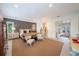 Spacious main bedroom with elegant decor, including designer furniture, and ample natural light at 2501 S Dundee St, Tampa, FL 33629