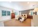 Beautiful main bedroom with accent wall, neutral carpet, and an abundance of natural light at 2501 S Dundee St, Tampa, FL 33629
