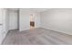 Bedroom features neutral carpeting and an en-suite bathroom at 2525 Arbor Wind Dr, Lutz, FL 33558
