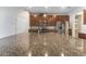 Kitchen featuring stainless steel appliances, granite countertops, and a large island at 2525 Arbor Wind Dr, Lutz, FL 33558