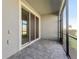 Relaxing covered lanai featuring a screened enclosure and paved flooring at 2525 Arbor Wind Dr, Lutz, FL 33558