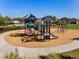 Community playground with slides, swings, and climbing structures for outdoor fun at 2525 Arbor Wind Dr, Lutz, FL 33558