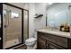 Cozy bathroom features a glass shower, and a sleek vanity with stylish fixtures and decor at 29002 Trevi Pl, Wesley Chapel, FL 33543