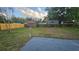 Spacious backyard with a shed and partial fencing at 3009 S Willow Dr, Plant City, FL 33566
