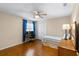 Cozy bedroom with wood floors, ceiling fan, and a comfortable layout at 3014 Ashland Ter, Clearwater, FL 33761