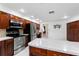 Well-equipped kitchen with stainless steel appliances, center island, and plenty of counter space at 3014 Ashland Ter, Clearwater, FL 33761