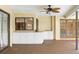 This outdoor space features a full kitchen setup and easy access to the pool and patio area at 3014 Ashland Ter, Clearwater, FL 33761