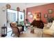 Stylish living room with courtyard view and eclectic decor at 3182 Windmoor N Dr, Palm Harbor, FL 34685