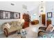 Warm and inviting living room with neutral tones and comfortable seating at 3182 Windmoor N Dr, Palm Harbor, FL 34685
