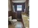 Bathroom featuring tiled shower, toilet, and granite vanity counter at 3607 N 13Th St, Tampa, FL 33605