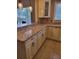 Kitchen area featuring granite countertops, ample cabinet space, and modern fixtures at 3607 N 13Th St, Tampa, FL 33605
