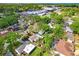 Cozy single-Gathering home surrounded by mature trees, offering a serene and private setting near schools at 4105 W Bay Villa Ave, Tampa, FL 33611