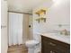 Updated bathroom with modern vanity and tiled walk-in shower at 4105 W Bay Villa Ave, Tampa, FL 33611