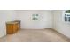 Bright, open room with tile floors, wet bar, and natural light at 4105 W Bay Villa Ave, Tampa, FL 33611