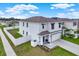Beautiful two-story home with a well-kept lawn at 414 Sunlit Coral St, Ruskin, FL 33570