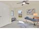 Office space with neutral tones and a natural light and a modern desk at 414 Sunlit Coral St, Ruskin, FL 33570