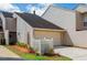 Charming home featuring a single-car garage and well-manicured landscaping at 4230 Hartwood Ln, Tampa, FL 33618