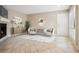 Bright living room features tile floors, fireplace, modern furniture, and stylish decor, creating a cozy and inviting atmosphere at 4230 Hartwood Ln, Tampa, FL 33618