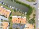 An aerial view of the condo shows the orange roof, canal access, and proximity to community amenities at 4306 Sunray Ct, Tampa, FL 33615