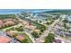 Aerial view of homes in a waterfront community with lush landscaping and easy water access at 4306 Sunray Ct, Tampa, FL 33615