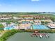 An aerial view showcasing the community's waterfront location, amenities, and well-maintained landscaping at 4306 Sunray Ct, Tampa, FL 33615