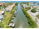 Aerial view of canal with docks behind condo buildings with boat access to harbor at 4306 Sunray Ct, Tampa, FL 33615