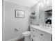 Clean, modern bathroom featuring a vanity with storage and a well-lit mirror at 4306 Sunray Ct, Tampa, FL 33615