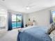 Bright bedroom with a private balcony, offering views and a refreshing transition from indoors to outdoors at 4306 Sunray Ct, Tampa, FL 33615