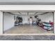A spacious garage interior providing ample storage space with shelves and a clean concrete floor at 4306 Sunray Ct, Tampa, FL 33615