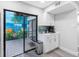 Cozy patio with a tropical mural, providing a relaxing outdoor space at 4306 Sunray Ct, Tampa, FL 33615