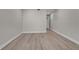 Bright bedroom with light colored wood floors at 455 Pinellas Bayway S # 2B, Tierra Verde, FL 33715