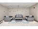 Outdoor lounge with stylish seating and a neutral palette, perfect for relaxing at 455 Pinellas Bayway S # 2B, Tierra Verde, FL 33715