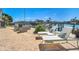 Relaxing pool deck with waterway views, lounge chairs and comfortable seating at 455 Pinellas Bayway S # 2B, Tierra Verde, FL 33715