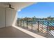 Balcony view showcasing scenic waterfront vistas and beautiful neighborhood homes at 455 Pinellas Bayway S # 4A, Tierra Verde, FL 33715