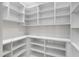 Well-organized pantry with ample shelving and countertop space for efficient storage at 455 Pinellas Bayway S # 4A, Tierra Verde, FL 33715