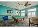 Entertainment area featuring a pool table, poker table, and scenic views at 5129 Se Salmon Se Dr # A, St Petersburg, FL 33705