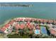 Waterfront community featuring a pool, tennis court, and beach access with beautiful views at 5559 Escondida S Blvd, St Petersburg, FL 33715