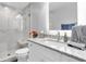 Elegant bathroom with marble countertops, modern fixtures, and glass-enclosed shower at 5559 Escondida S Blvd, St Petersburg, FL 33715