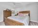 Cozy bedroom showcasing a bed with soft pillows and classic furnishings at 5559 Escondida S Blvd, St Petersburg, FL 33715