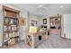 Functional home office space with bookshelves and desk for an organized workspace at 5559 Escondida S Blvd, St Petersburg, FL 33715