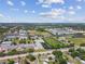 Aerial view of neighborhood with schools, athletic fields, and mature trees at 5601 16Th N St, St Petersburg, FL 33703