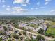 Wide aerial view of the neighborhood showcasing the many mature trees at 5601 16Th N St, St Petersburg, FL 33703