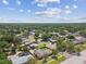 Aerial view of the neighborhood showcasing many mature trees and neatly kept homes at 5601 16Th N St, St Petersburg, FL 33703