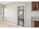 Bedroom view through doorway with hardwood floors and a ceiling fan at 5601 16Th N St, St Petersburg, FL 33703