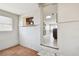 Bonus room with terracotta tiles, view to kitchen, and access to other rooms at 5601 16Th N St, St Petersburg, FL 33703