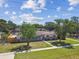 Beautiful home featuring a well-maintained lawn and mature landscaping at 5601 16Th N St, St Petersburg, FL 33703