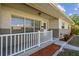 Close-up of a well-maintained front porch with decorative landscaping at 5601 16Th N St, St Petersburg, FL 33703